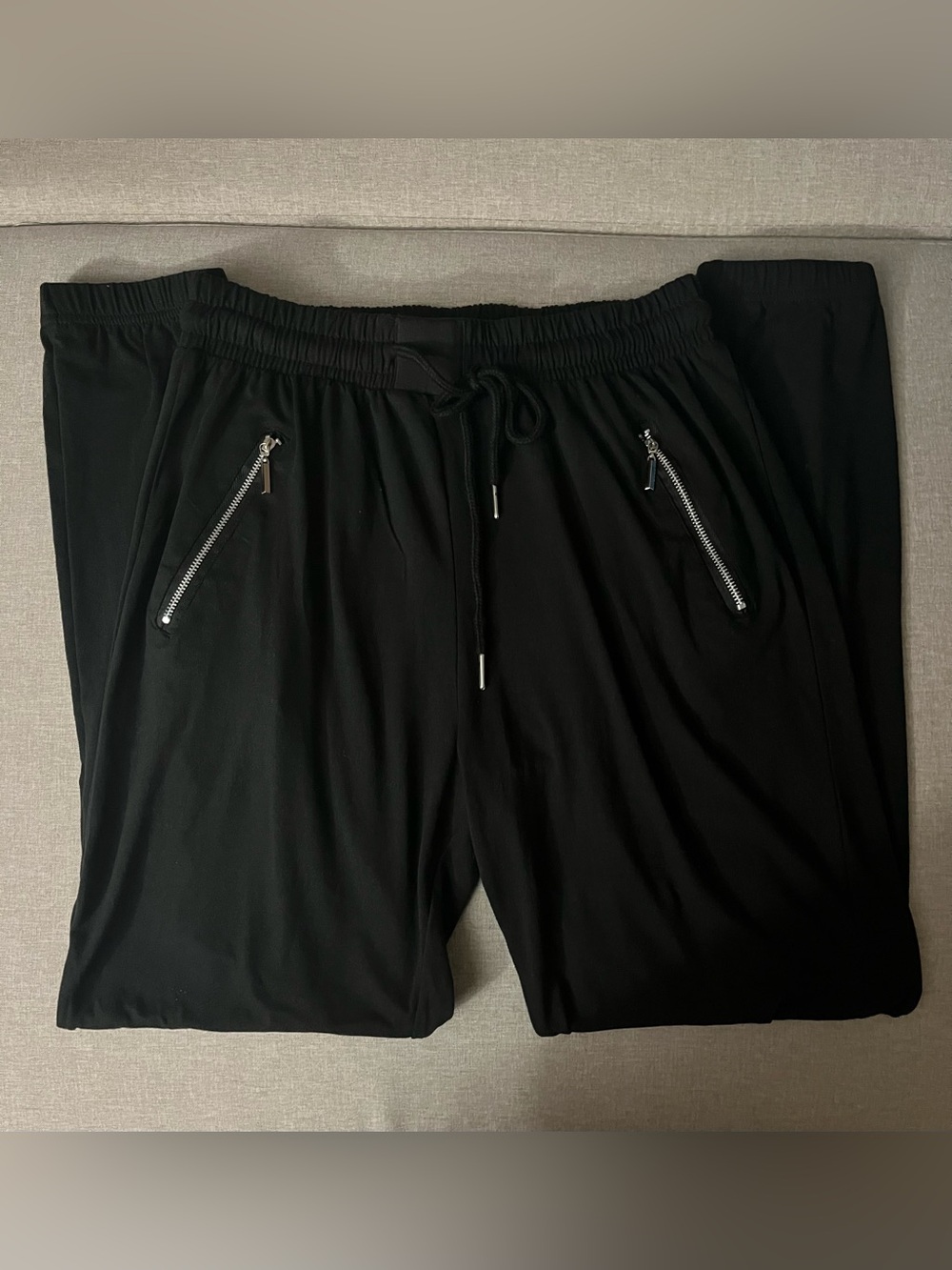 black joggers with zipper pockets
